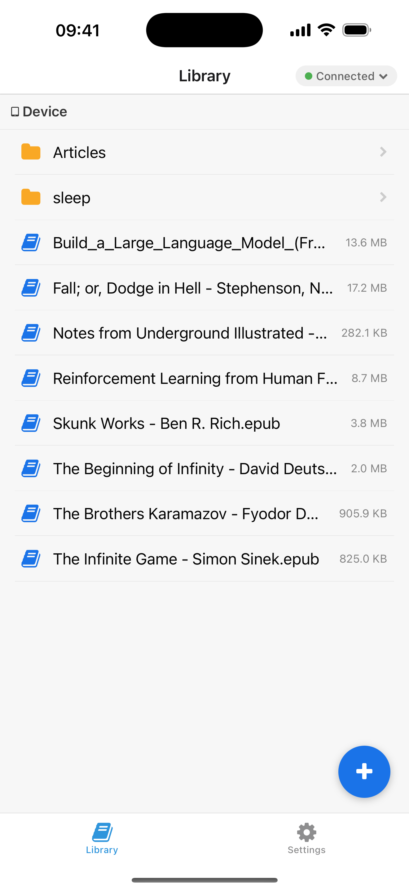 CrossPoint Sync library screen showing connected status and file list